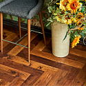 Фотографии в интерьере, ПВХ плитка, кварц виниловый ламинат Vinilam Parquet Herringbone Glue Парижский